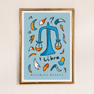 Libra zodiac art print with the libra trait balanced beauty written underneath the hand-drawn illustration on a blue background.